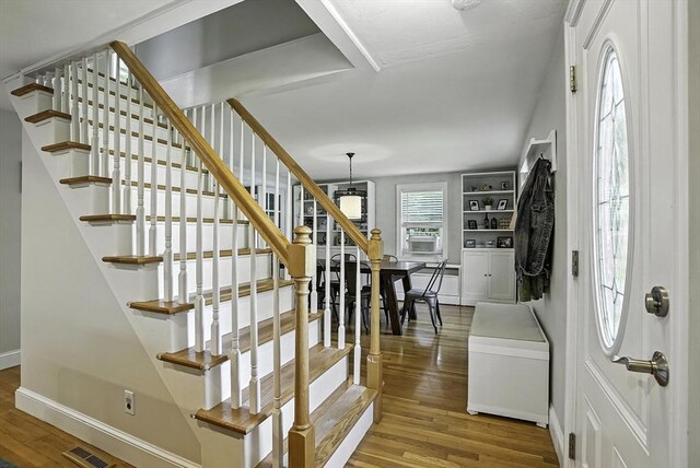7 Vermont Ave, Natick, MA 01760 - foyer entrance featuring stairs and wood finished floors