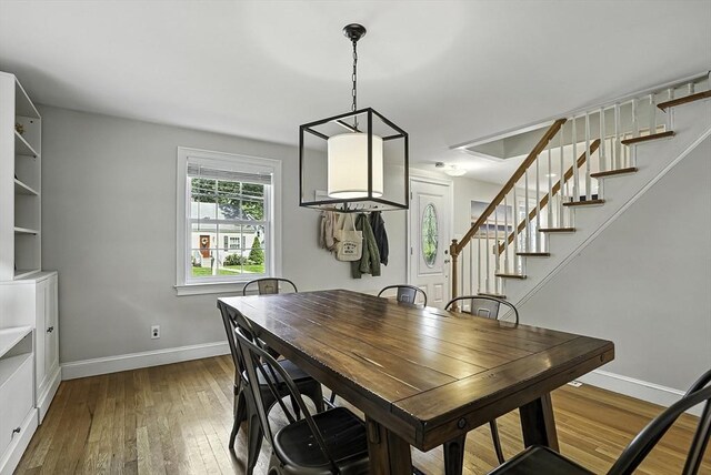 7 Vermont Ave, Natick, MA 01760 - dining area with stairway and hardwood / wood-style flooring