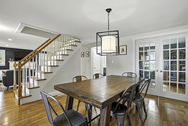 7 Vermont Ave, Natick, MA 01760 - dining room with hardwood / wood-style floors, stairs, and french doors