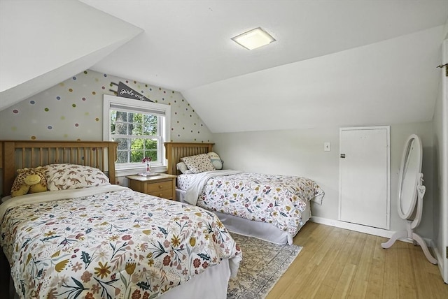 7 Vermont Ave, Natick, MA 01760 - bedroom with light wood-style flooring and lofted ceiling