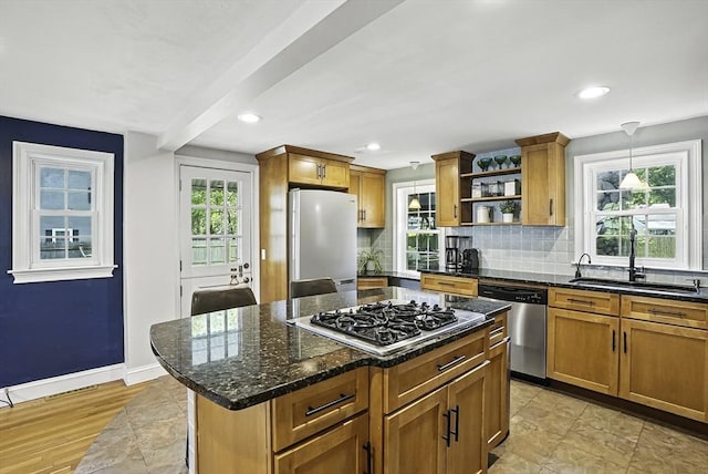 7 Vermont Ave, Natick, MA 01760 - kitchen with stainless steel appliances, open shelves, brown cabinets, healthy amount of natural light, and recessed lighting