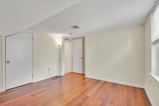 17-1 Parkers Ln Unit 1, Waltham, MA 02453 - empty room with light wood finished floors and baseboards