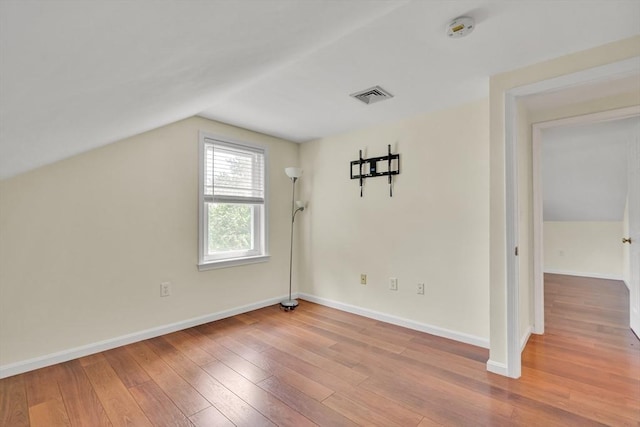 17-1 Parkers Ln Unit 1, Waltham, MA 02453 - additional living space featuring lofted ceiling, wood-type flooring, and baseboards