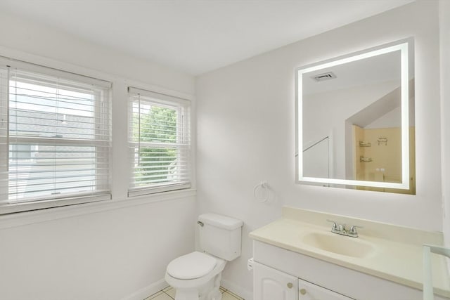 17-1 Parkers Ln Unit 1, Waltham, MA 02453 - bathroom featuring vanity, baseboards, and toilet