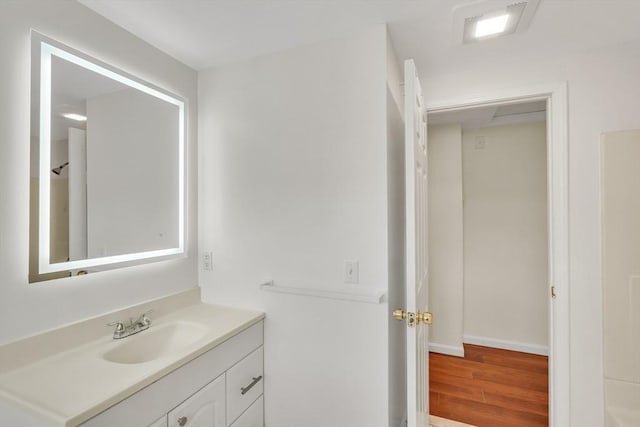 17-1 Parkers Ln Unit 1, Waltham, MA 02453 - bathroom featuring vanity and wood finished floors