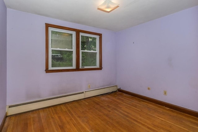 200 Dana Ave, Boston, MA 02136 - unfurnished room featuring a baseboard radiator, wood finished floors, and baseboards