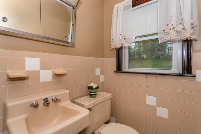 200 Dana Ave, Boston, MA 02136 - bathroom featuring a sink, toilet, tile walls, and a wainscoted wall