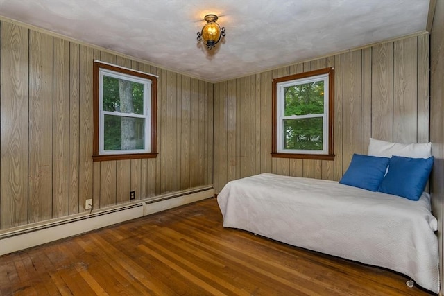 200 Dana Ave, Boston, MA 02136 - bedroom featuring baseboard heating, multiple windows, hardwood / wood-style flooring, and wooden walls