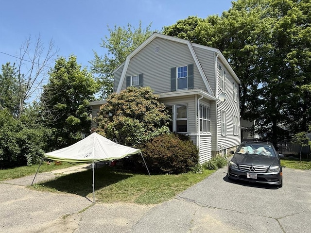 62 Marion St, Fitchburg, MA 01420 - view of property exterior featuring a gambrel roof and driveway