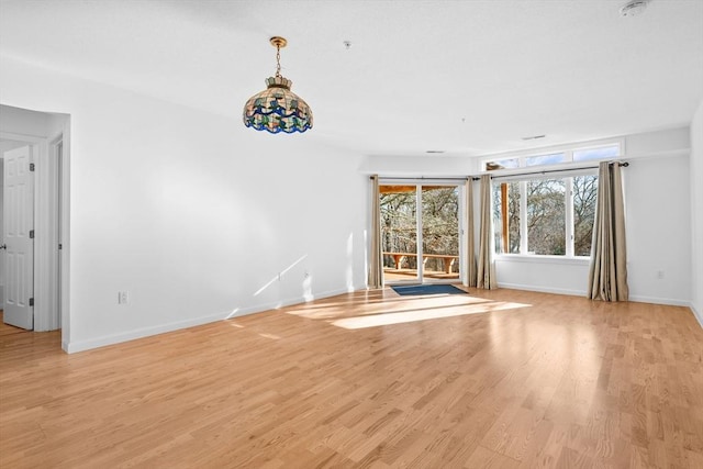 unfurnished room featuring light wood-type flooring