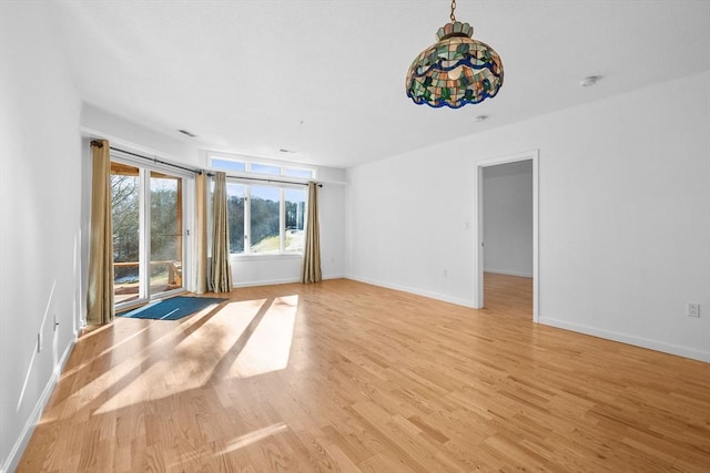 unfurnished room featuring light hardwood / wood-style flooring