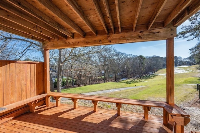 wooden terrace with a yard