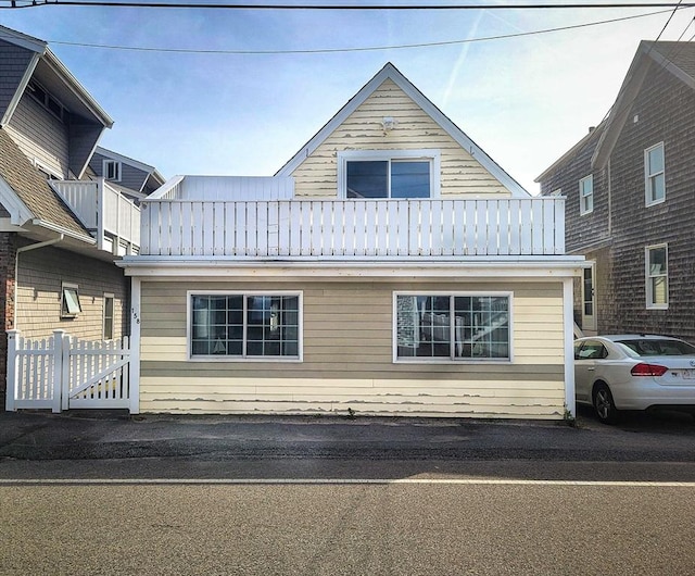 158 Turner Rd, Scituate, MA 02066 - view of property exterior with a balcony and metal roof