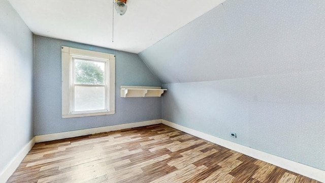 11 Quincy Ave, Norwood, MA 02062 - additional living space featuring wood finished floors and vaulted ceiling
