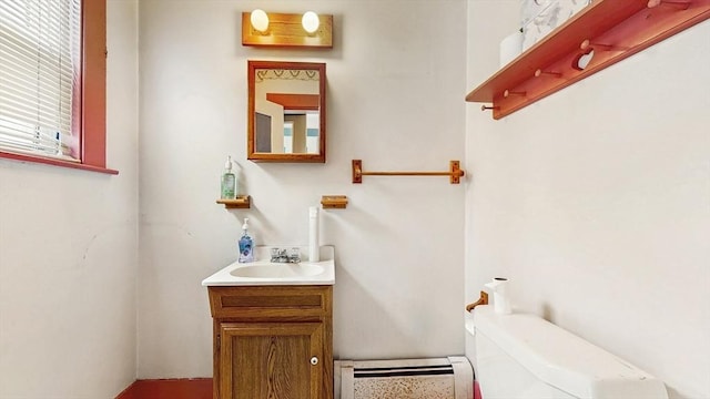 11 Quincy Ave, Norwood, MA 02062 - bathroom with a baseboard heating unit and vanity