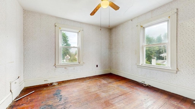 11 Quincy Ave, Norwood, MA 02062 - empty room featuring hardwood / wood-style flooring and a ceiling fan