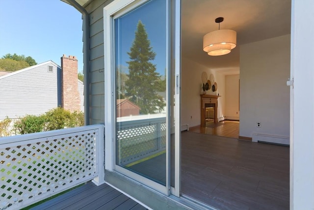 exterior space featuring a baseboard radiator