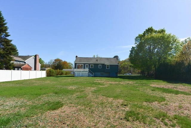 view of yard featuring fence