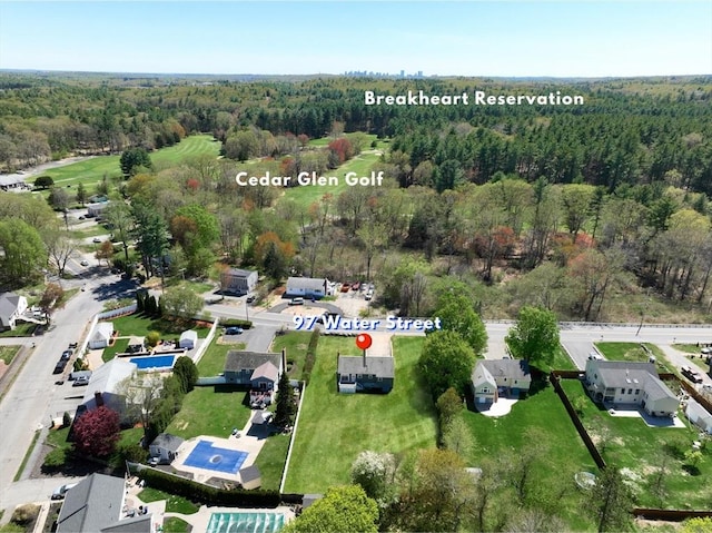 drone / aerial view with a view of trees