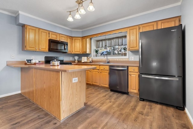 kitchen with sink, refrigerator, kitchen peninsula, dishwasher, and stove