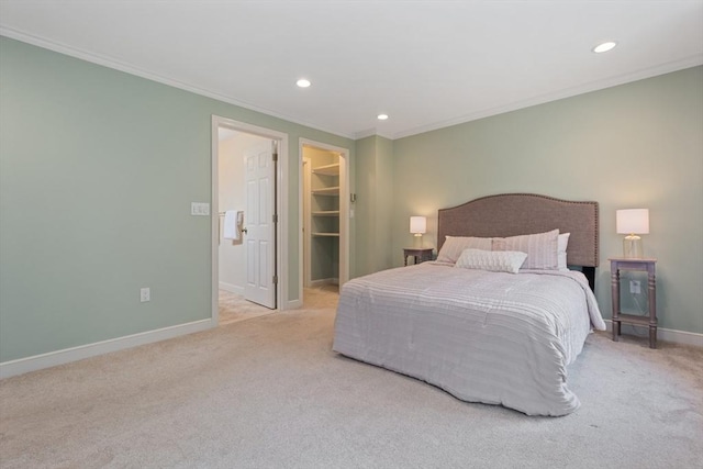 501 Lexington St Unit 35, Waltham, MA 02452 - carpeted bedroom featuring baseboards, recessed lighting, crown molding, and a walk in closet