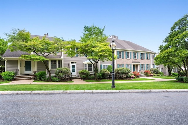 501 Lexington St Unit 35, Waltham, MA 02452 - colonial-style house featuring a front yard and entry steps
