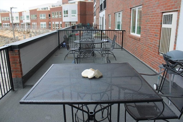 balcony featuring outdoor dining area