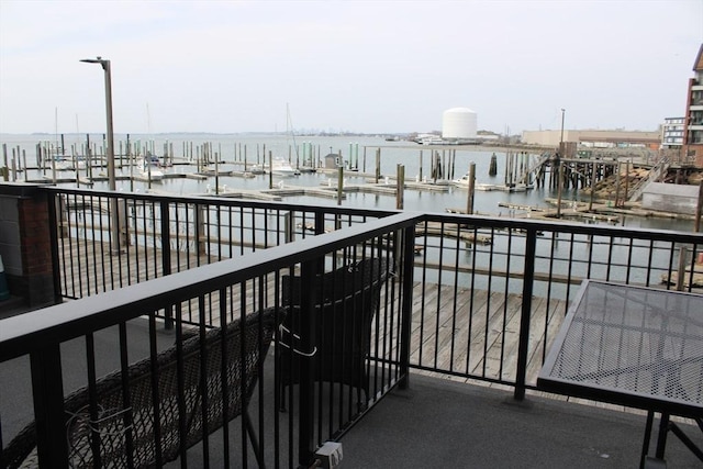 balcony featuring a water view