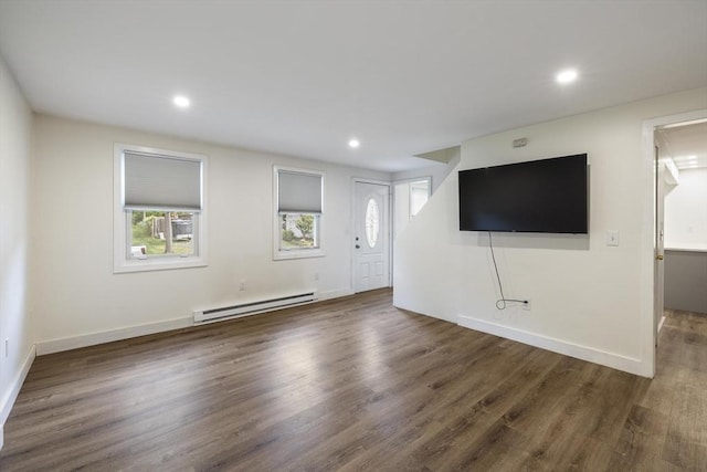 53 Kalish Ave, Enfield, CT 06082 - unfurnished living room featuring a baseboard radiator, plenty of natural light, wood finished floors, recessed lighting, and baseboards