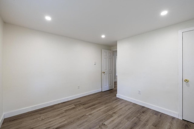 53 Kalish Ave, Enfield, CT 06082 - empty room featuring wood finished floors, recessed lighting, and baseboards