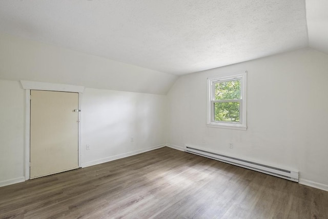 53 Kalish Ave, Enfield, CT 06082 - bonus room with a baseboard radiator, lofted ceiling, wood finished floors, baseboards, and a textured ceiling