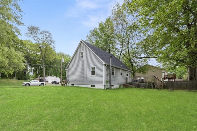 53 Kalish Ave, Enfield, CT 06082 - view of side of home with a deck, a yard, and a shingled roof