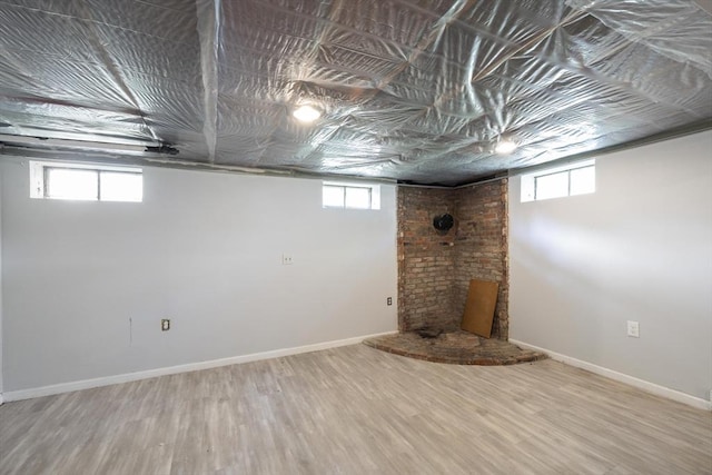 53 Kalish Ave, Enfield, CT 06082 - below grade area featuring wood finished floors and baseboards