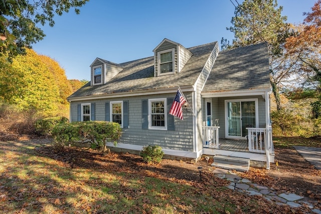 cape cod home with a porch