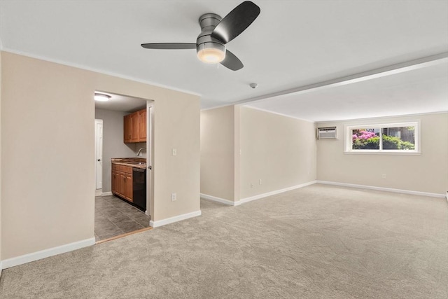 127 King St Unit 104, Franklin, MA 02038 - carpeted empty room with ceiling fan, a sink, baseboards, a wall mounted air conditioner, and crown molding