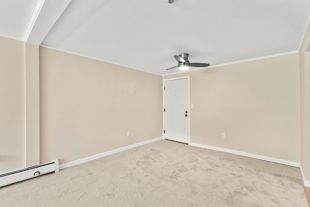 127 King St Unit 104, Franklin, MA 02038 - carpeted spare room featuring a baseboard radiator, ceiling fan, baseboards, and ornamental molding