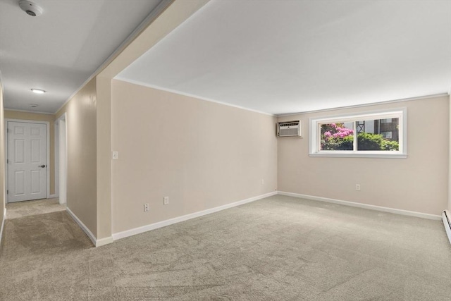 127 King St Unit 104, Franklin, MA 02038 - carpeted spare room with ornamental molding, a smoke detector, a wall mounted AC, and baseboards