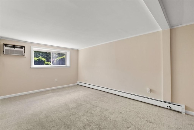 127 King St Unit 104, Franklin, MA 02038 - unfurnished room featuring a baseboard heating unit, a wall mounted AC, carpet flooring, and baseboards