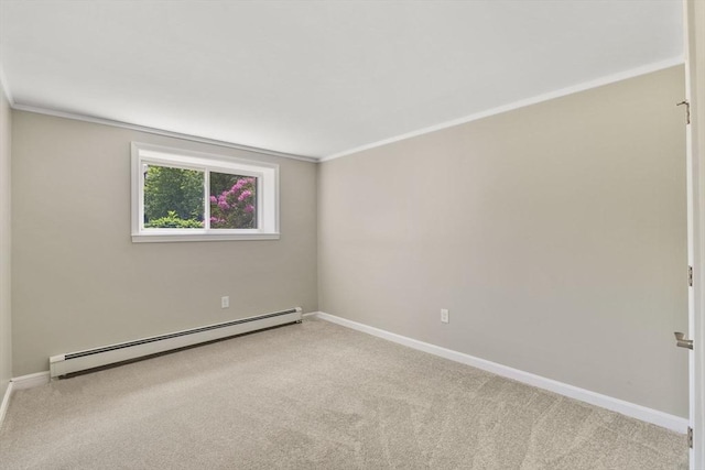 127 King St Unit 104, Franklin, MA 02038 - empty room featuring a baseboard heating unit, carpet floors, crown molding, and baseboards