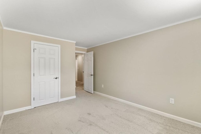 127 King St Unit 104, Franklin, MA 02038 - unfurnished bedroom with ornamental molding, baseboards, and carpet floors