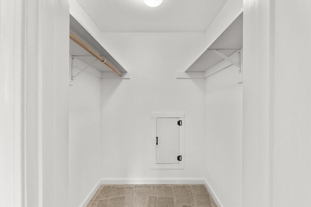 127 King St Unit 104, Franklin, MA 02038 - spacious closet featuring carpet