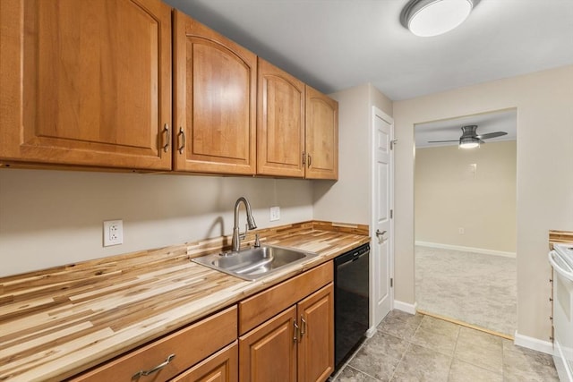 127 King St Unit 104, Franklin, MA 02038 - kitchen featuring dishwasher, wooden counters, a sink, baseboards, and ceiling fan