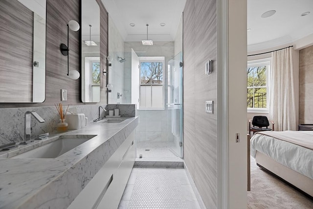 8 Rutland Sq Unit 2, Boston, MA 02118 - ensuite bathroom featuring plenty of natural light, a stall shower, double vanity, and crown molding