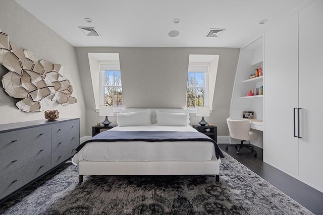 8 Rutland Sq Unit 2, Boston, MA 02118 - bedroom with multiple windows, a desk, dark wood-style floors, and baseboards