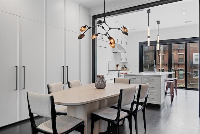 8 Rutland Sq Unit 2, Boston, MA 02118 - dining area with dark wood-style floors, a chandelier, and recessed lighting