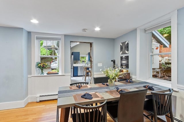 18 River St Unit 18, Andover, MA 01810 - dining area featuring baseboard heating, light wood finished floors, and recessed lighting
