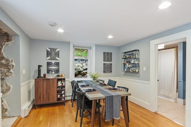 18 River St Unit 18, Andover, MA 01810 - dining area with wainscoting, light wood-style flooring, a baseboard radiator, and recessed lighting