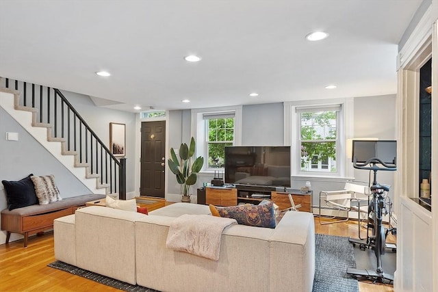 18 River St Unit 18, Andover, MA 01810 - living room with light wood-style flooring, stairs, recessed lighting, and baseboard heating