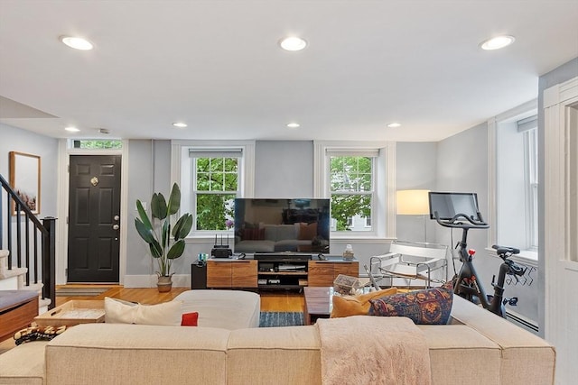 18 River St Unit 18, Andover, MA 01810 - living room with wood finished floors, stairway, and recessed lighting