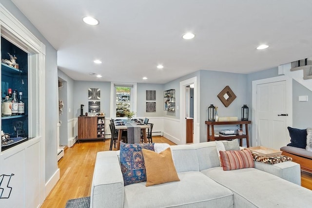 18 River St Unit 18, Andover, MA 01810 - living area with light wood-style floors, recessed lighting, a baseboard radiator, and a baseboard heating unit